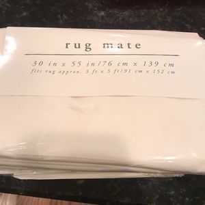 NWT Pier 1 rug mate. 30x55 inches